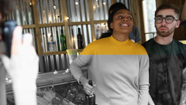 Friends mucking around and posing for photos