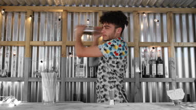 Bar tender working in a street food bar