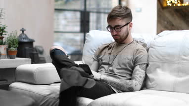 Young adult male on smartphone