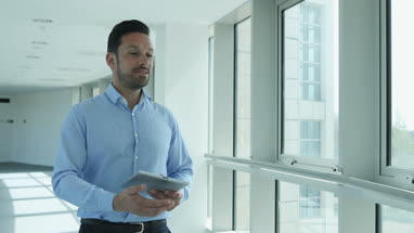 Businesswoman shaking hands with businessman
