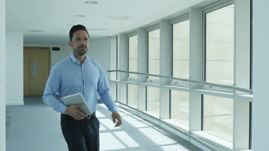 Businesswoman shaking hands with businessman