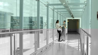 Business colleagues looking at digital tablet together