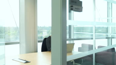 Female executive working in office on laptop