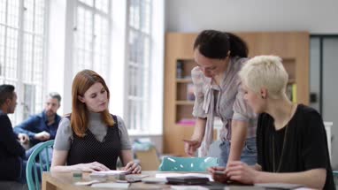 Female designer leading a project planning meeting