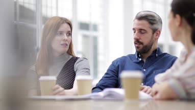Businessman leading a serious meeting