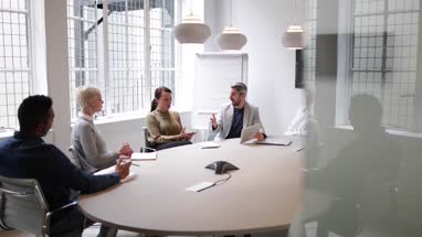 Business executives in a boardroom meeting