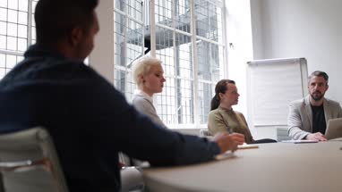 Business executives in a boardroom meeting