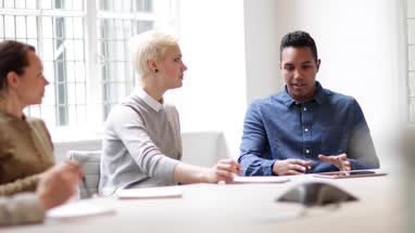 Businessman having an idea in a business meeting