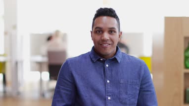 Portrait of male entrepreneur in a modern shared workplace