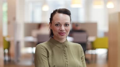 Portrait of female entrepreneur in a modern shared workplace