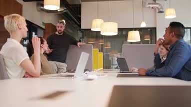 Team manager talking to his business team