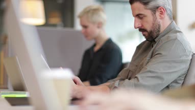 Freelancers working in a shared office space