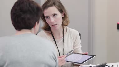 Female Medical Doctor explaining test results to patient