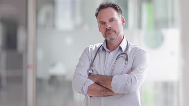 Portrait of Male Doctor in Hospital entrance