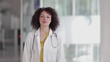 Portrait of confident Female Doctor in Hospital
