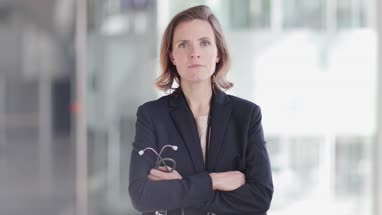 Portrait of confident Female Doctor in Hospital