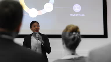 Female executive leading a training conference