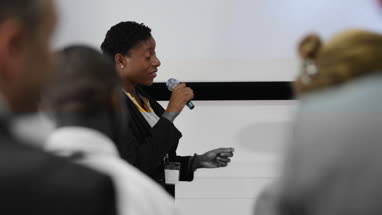 Female executive leading a training conference