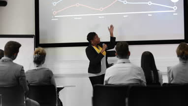 Female executive leading a training conference