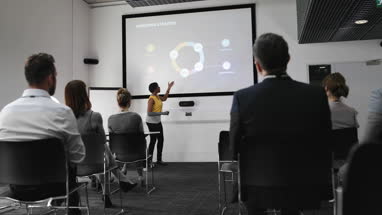 Female executive leading a training conference
