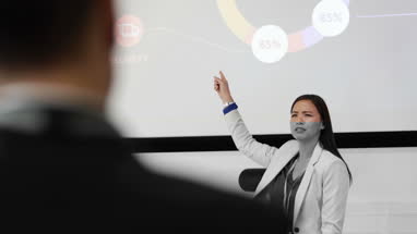 Female executive leading a training conference