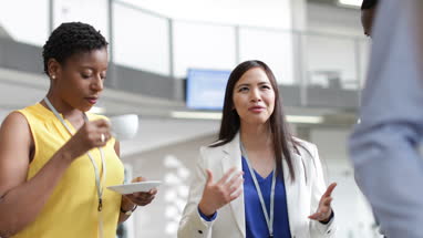 Female business executives at a networking event
