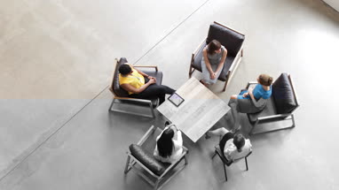 Overhead shot of group of businesswomen in a meeting