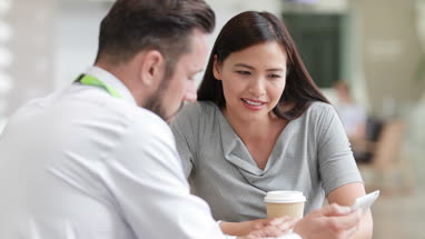 Businesswoman listening to a presentation