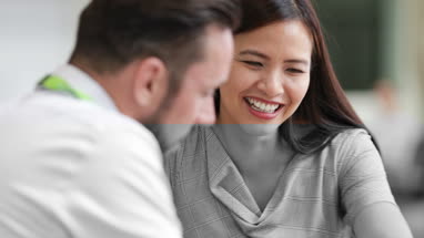 Businesswoman listening to a presentation