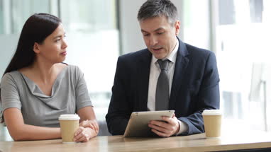 Businesswoman listening to a presentation