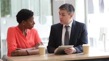 Businesswoman listening to a presentation