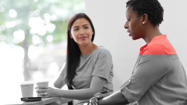Businesswomen meeting with coffee