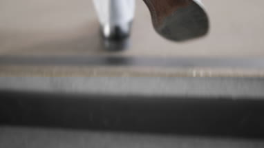 Close-up businessman’s feet walking up staircase