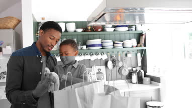 Father teaching son about food