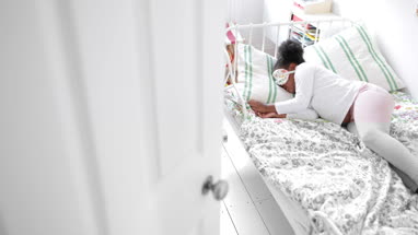 Girl taking a nap with an eye mask