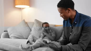 Father and Son playing with smartphones