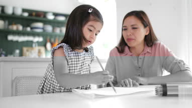 Girl learning how to write 