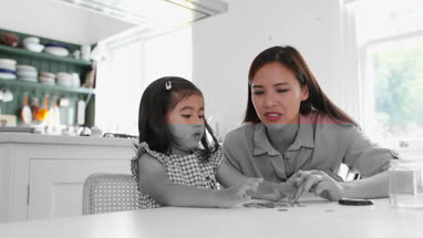 Girl counting her pocket money