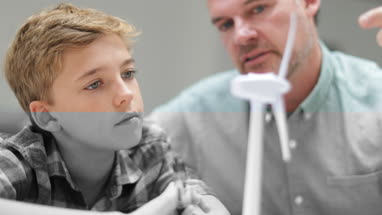 Father explaining to Son how wind turbines work