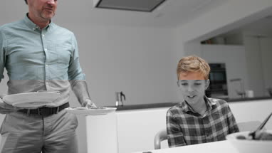 Father giving his Son a meal