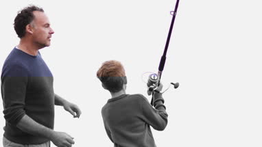 Father helping Son fish