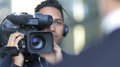 Cameraman filming for media broadcasting