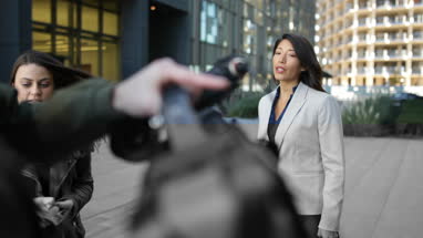 TV presenter having make-up applied on location