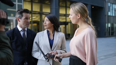 Media group interview being recorded for broadcast