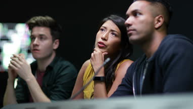 Operators in a control room at a television studio