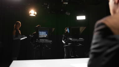 TV recording studio with auto queue ready