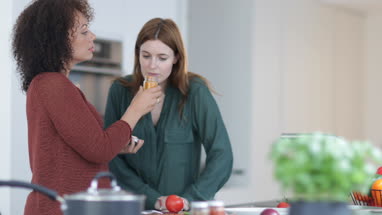 Adult female smelling a spice