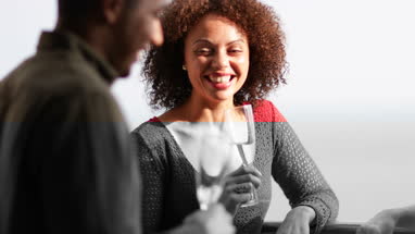 Friends enjoying champagne outdoors