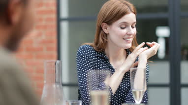 Friends eating a meal outdoors