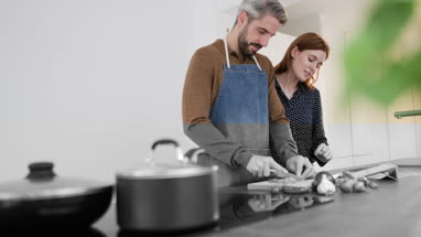 Couple preparing a meal together